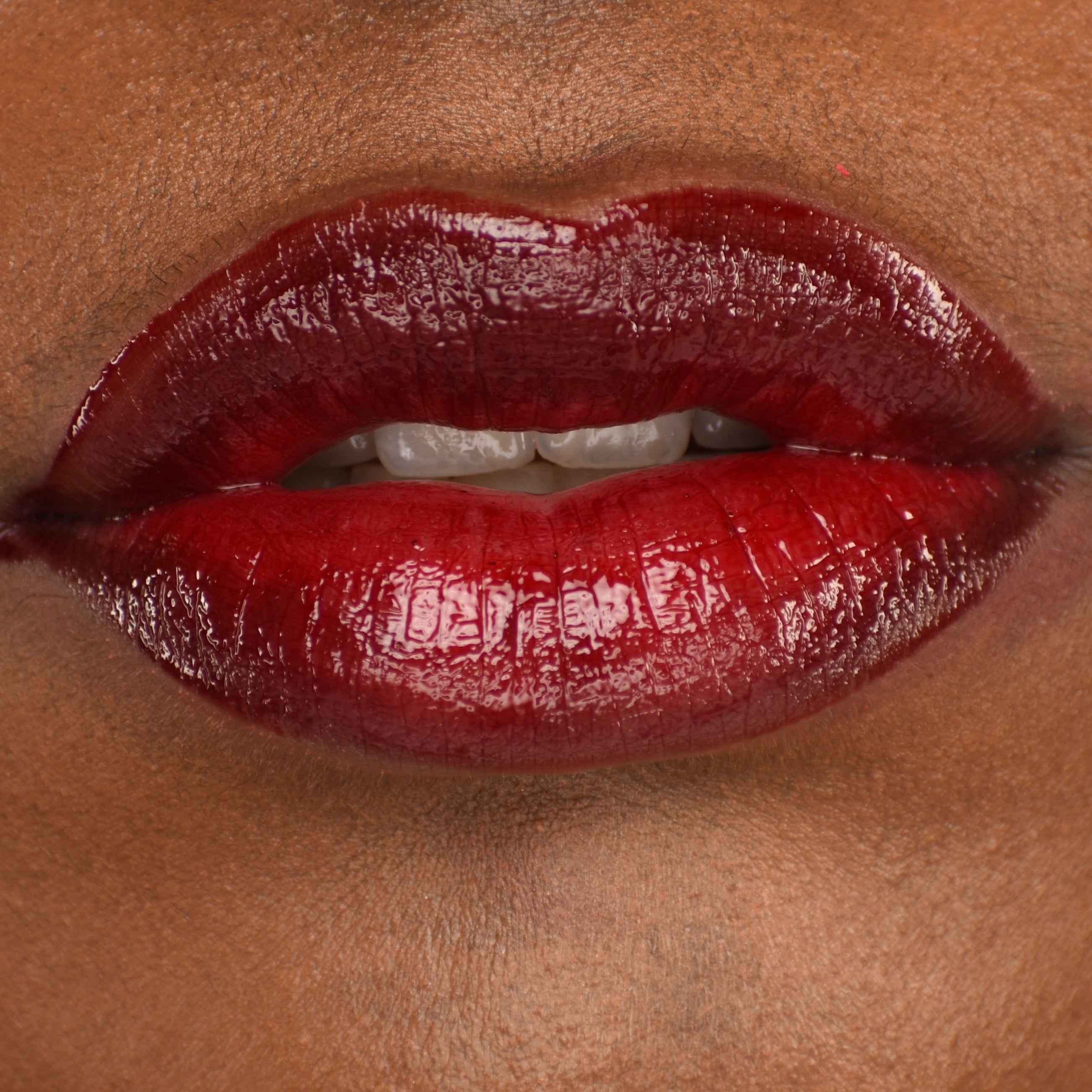 Woman wearing Passion ForHerCosmetics lipgloss