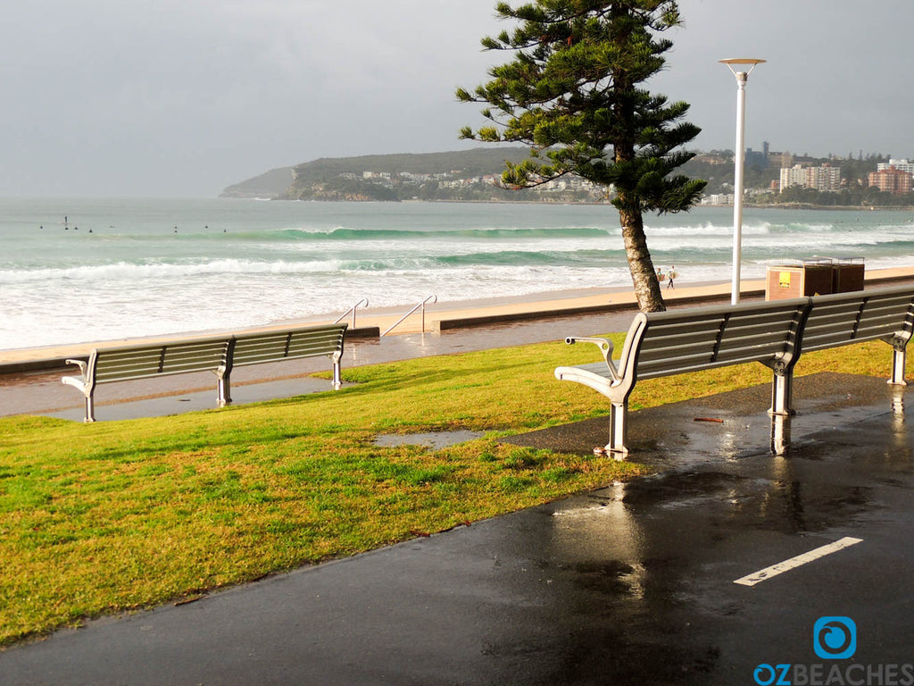 Sun shining through after a downpour at Manly Beach