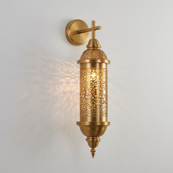 moroccan wall sconce on a plane white wall 