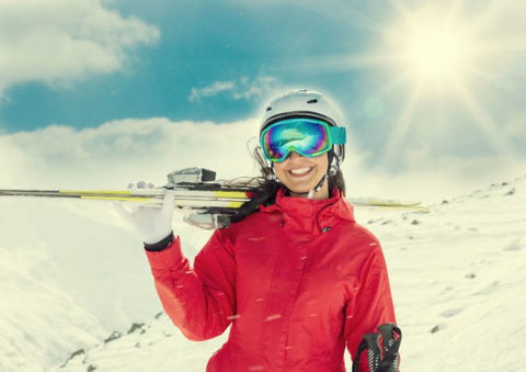Layers for Healthy Winter Skin Care.  Women skiing