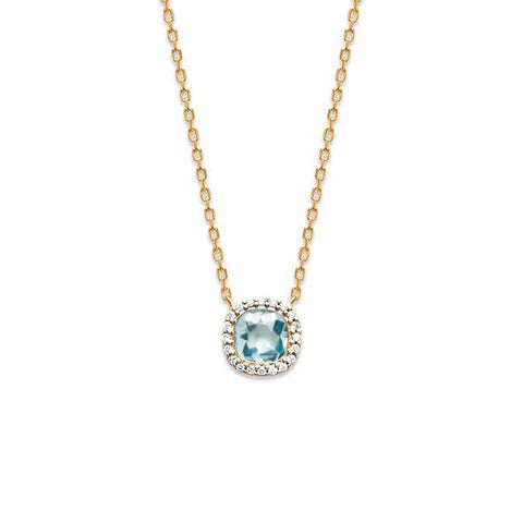 Our Cushion Me necklace is 18k gold plate with an aqua cushion shaped stone feature, surrounded by a beautiful cluster of cubic zirconia.