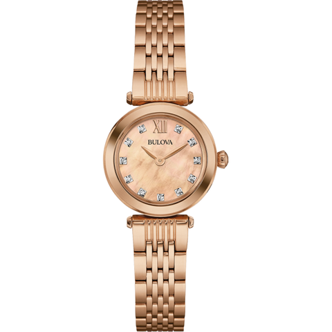Gorgeously attractive ladies watch is added to the Diamonds range by Bulova. A pink mother of pearl analogue display sparkles with cute diamond stud hour markers. Slender rose gold dials are powered by quartz and made to gleam under mineral crystal glass. A beautiful rose gold stainless steel bracelet strap, complete with deployment clasp, finishes the watch perfectly.