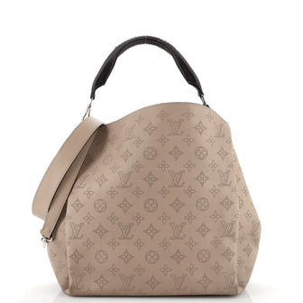 Louis Vuitton Ivory Perforated Monogram Mahina Leather Babylone Silver  Hardware, 2015 Available For Immediate Sale At Sotheby's