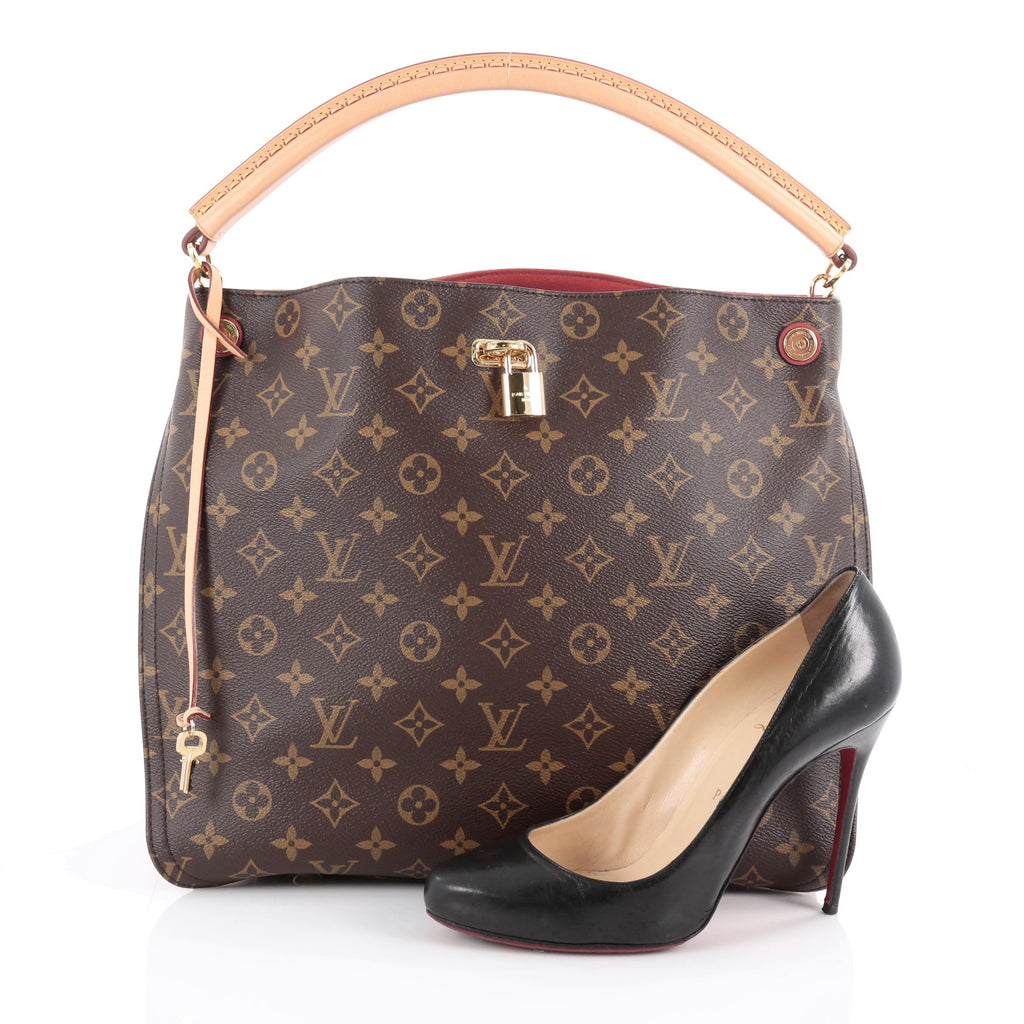 Buy Louis Vuitton Gaia Handbag Monogram Canvas Brown 2071501 – Rebag