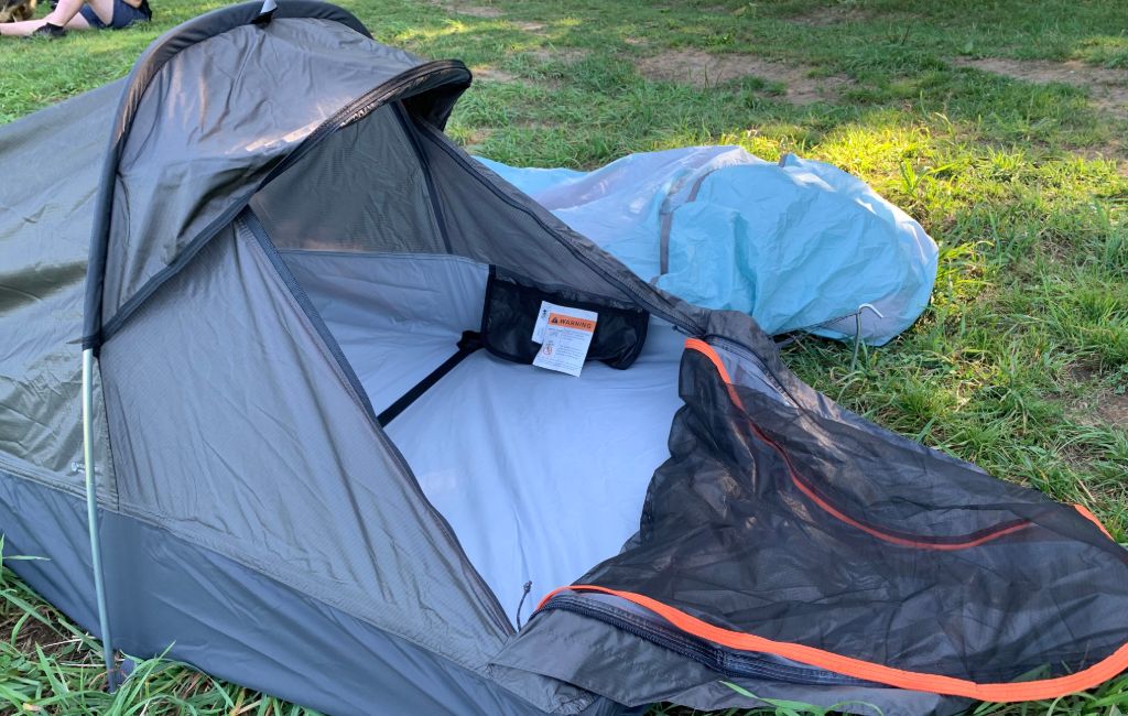 WINTER CAMPING ALONE IN A BIVVY BAG UNDER A TARP IN A HUGE FOREST Fire  Cooked Fish Dish Camping UK  YouTube