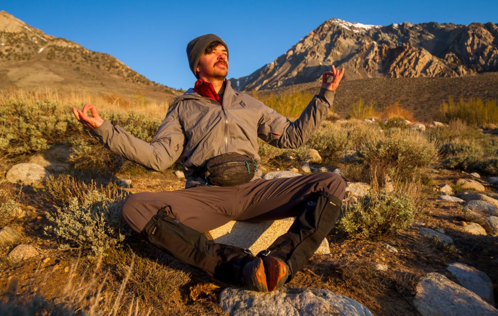 hiker "meditating" with gaiters