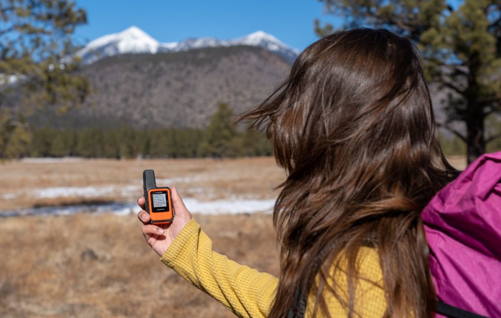 hiker using garmin inreach mini