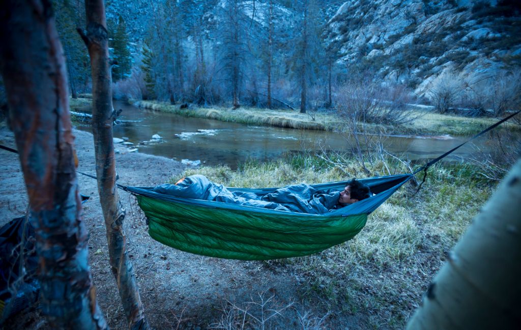 hiker using a hammock underquilt