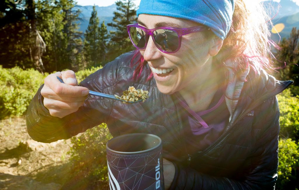 hiker eating from jetboil flash