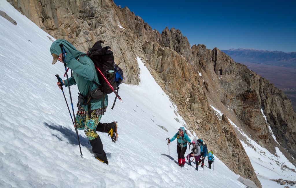 hikers using trekking poles