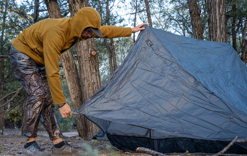 pitching a tent in rain pants