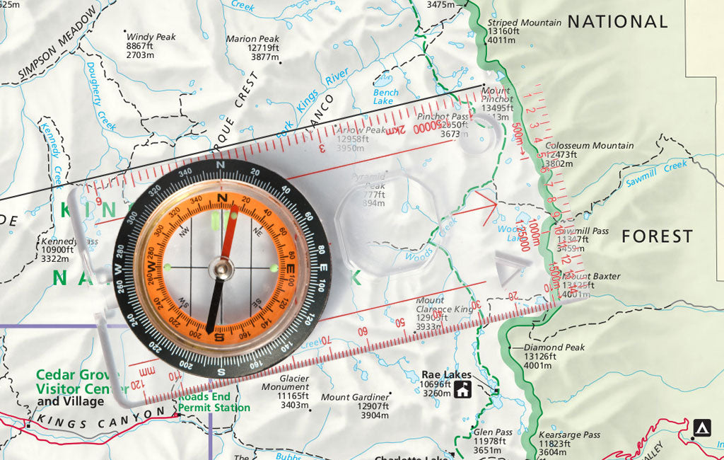 how to use a compass using the orienting arrow