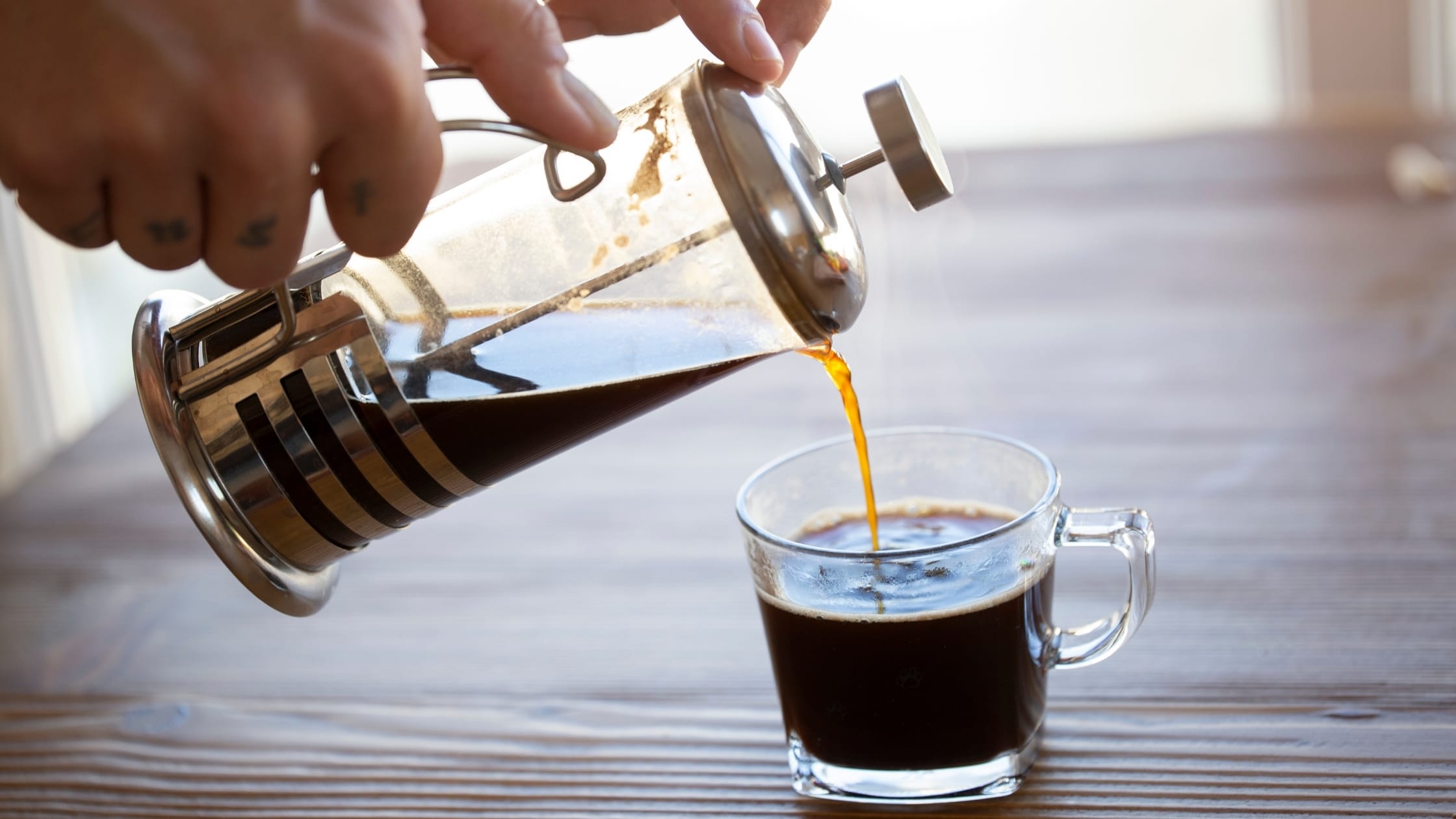 Brewing coffee on a French Press