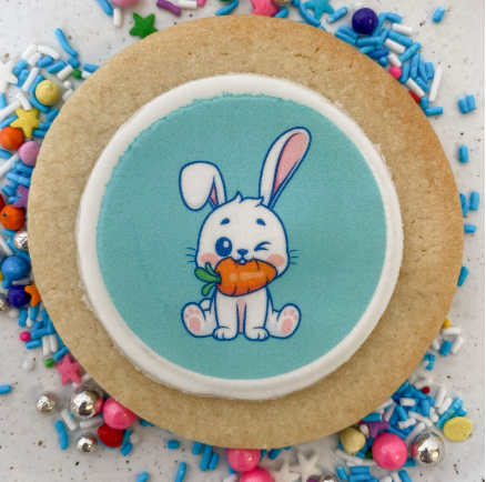 brithday sugar cookie with image of cartoon bunny ready for delivery