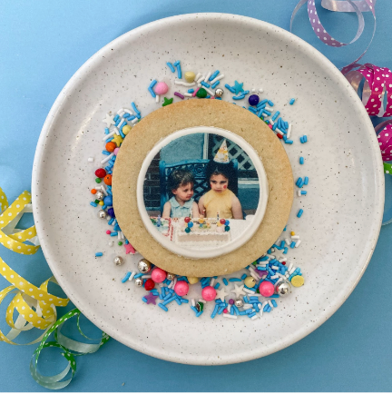 birthday sugar cookie with custom image of children ready for delivery