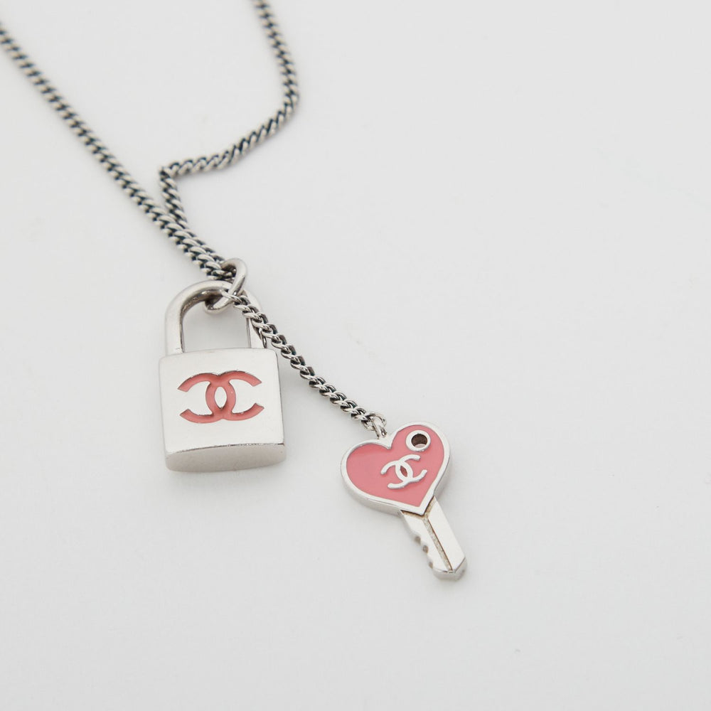 Chanel Silver Toned CC Padlock and Heart Key Necklace at 1stDibs  chanel  lock necklace chanel key necklace chanel lock and key necklace