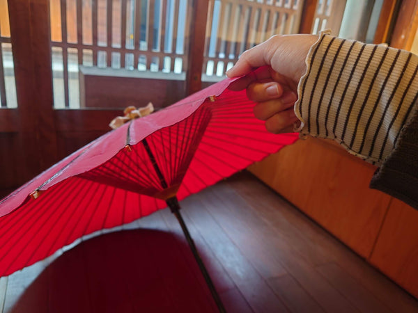 The wrong way to hold a Japanese umbrella