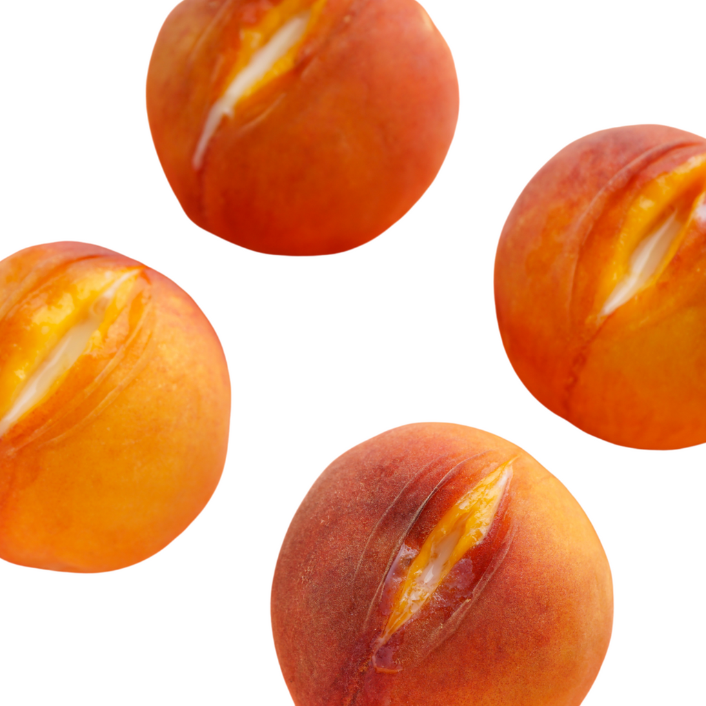 peaches cut out to look like vulvas