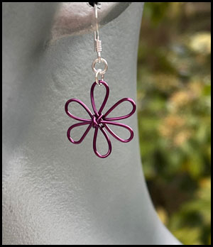 elfin alchemy flower earrings in purple