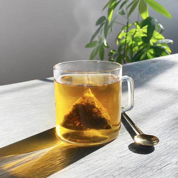 Hot steaming mug of Clover Immunity tea