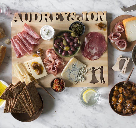 overhead: monogrammed charcuterie board with Audrey & John