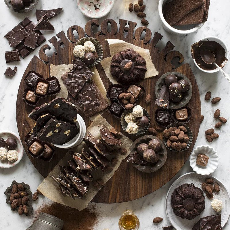 overhead: wooden carved chocoholic lazy Susan with macarons