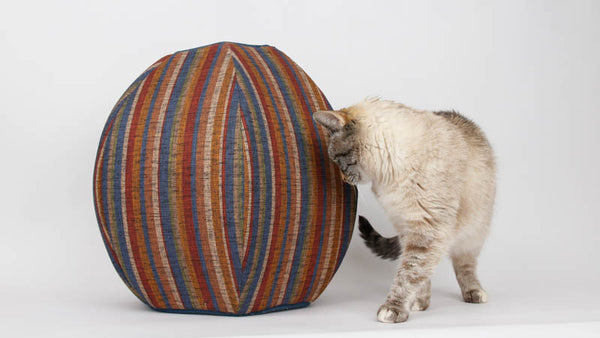 The fabric for the Multi-Stripe Cat Ball® cat bed looks textured, like a woven rug, but is actually a smooth cotton fabric.
