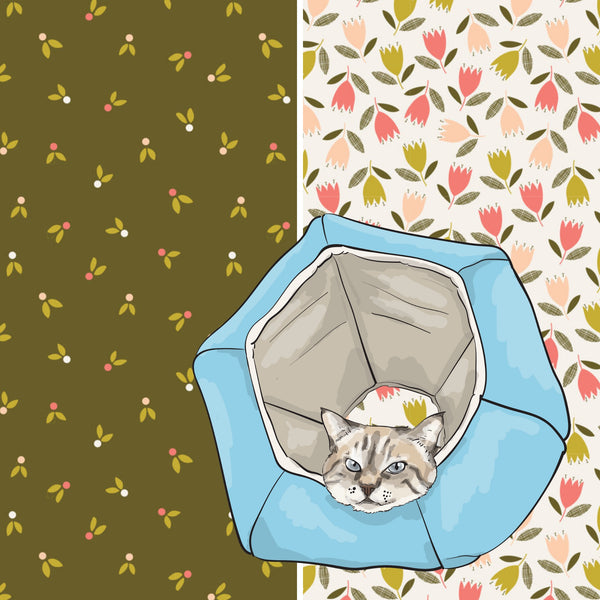The cat Ball cat bed made with a Felicity Fabrics print with an olive green background