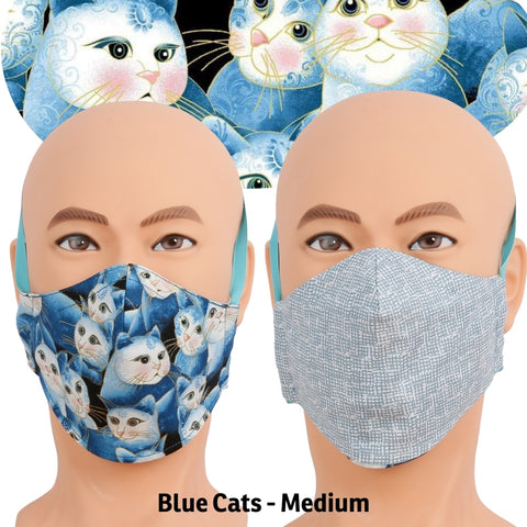Reversible face mask made with pretty blue cat fabric