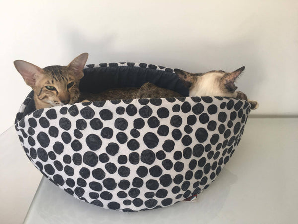 Two cats in a jumbo size Cat Canoe® cat bed. Photo by Purrmania.