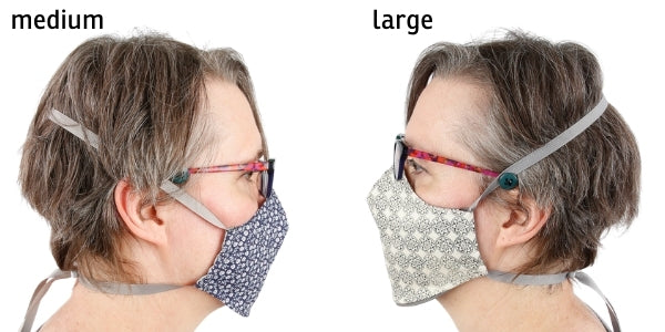 Compare the reversible face mask in size medium to large on the same person