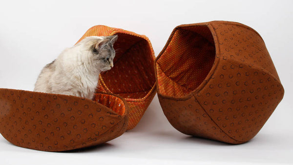 The Cat Ball® and Cat Canoe® made in coordinating brown and orange fabrics