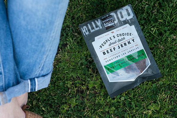 Jerky on grass with jeans and shoes