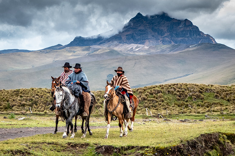 Quechua Indians riding in the Andes mountains. 