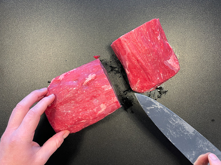 Sizing down a large piece of meat for beef jerky.