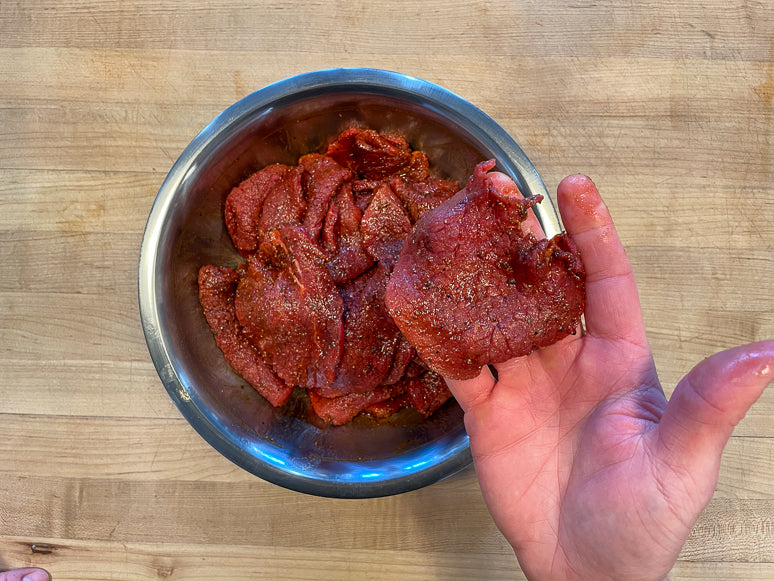 Marinate the meat for beef jerky.