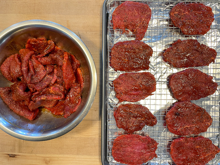 Laying the jerky on the screen.