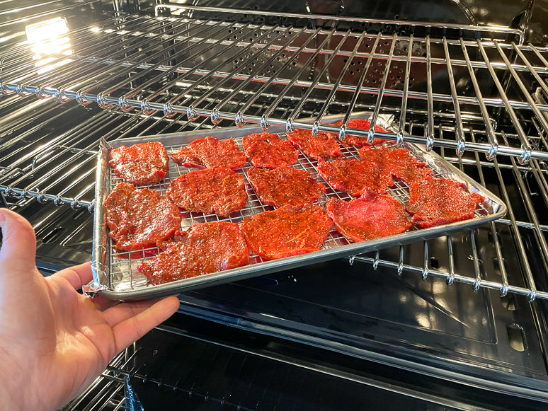 Cooking and drying the beef jerky.