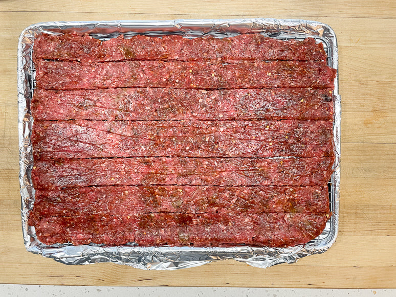 Ground beef jerky strips formed by hand.