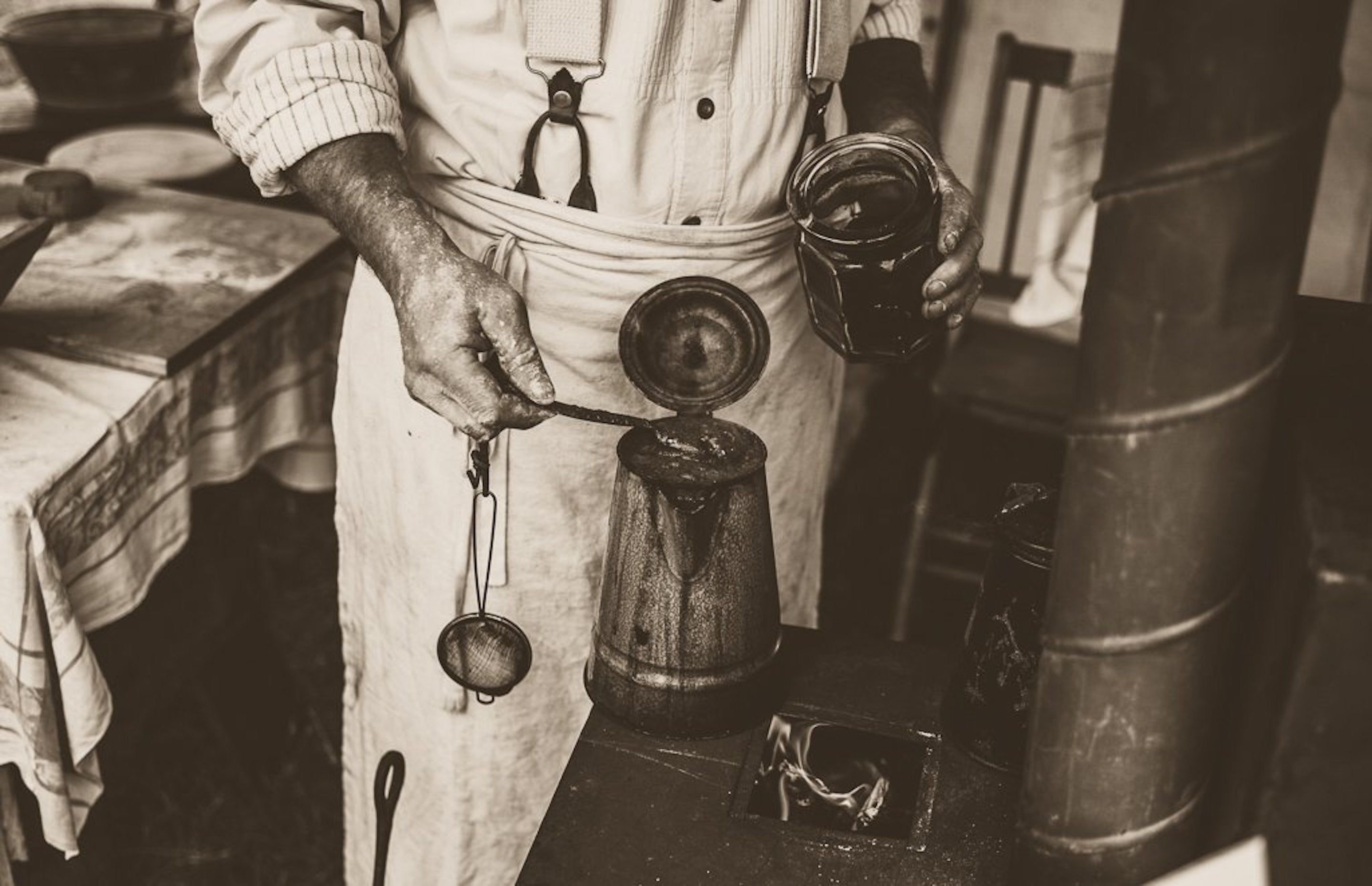 Man's Hand Making Coffee