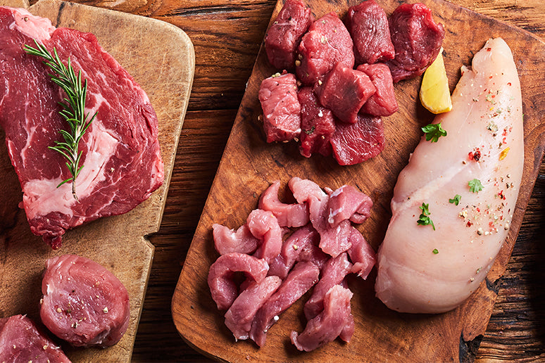 Raw meat on a wood board