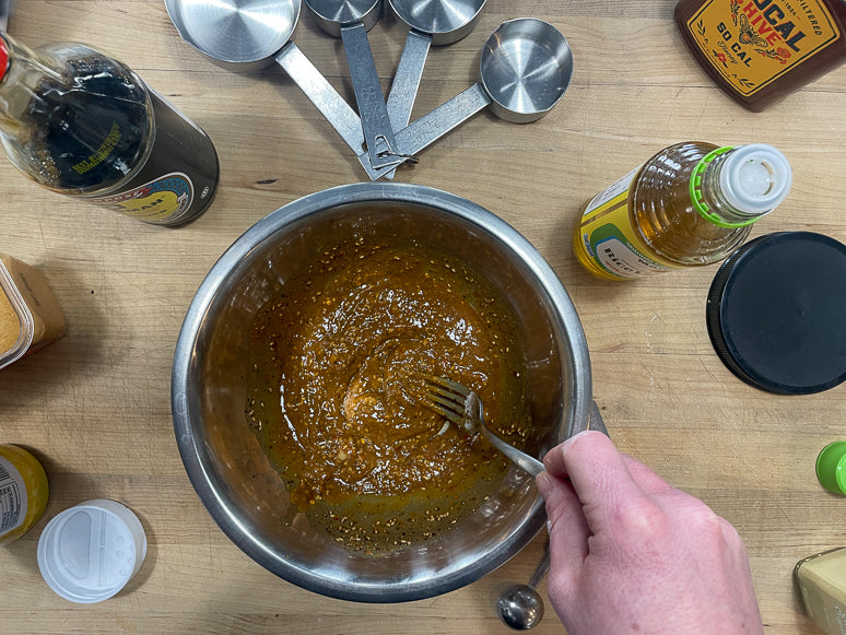 Mixing the salmon jerky marinade.