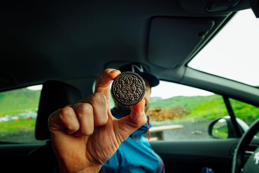 Someone holding Cookies in the car