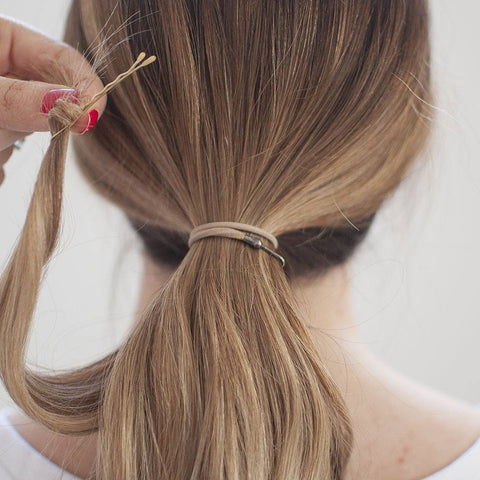 wrap hair around ponytail with bobby pin