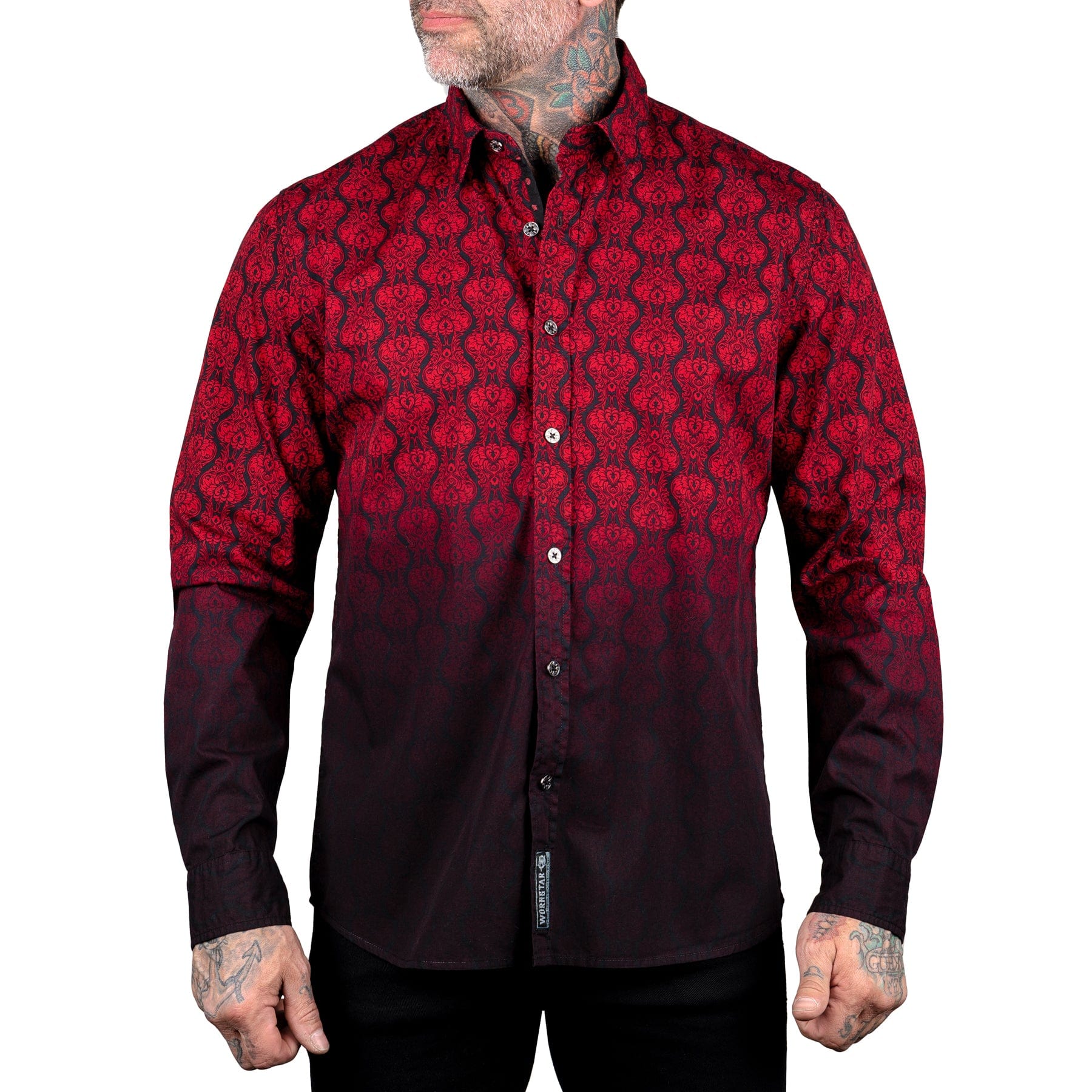 • Wornstar Rocknrolla Collection • Premium button-down long sleeve shirt • 100% Pre-washed cotton • Garment washed for superior soft, worn in feel • All over ruby on black printed pattern graphic • Black ombre dip dye • Skull and fleur graphic detail on inside cuffs and collar • Wornstar badge gun metal rivet on back collar • Skull crossed dagger gun metal buttons • Wornstar Rocknrolla Collection woven label on front