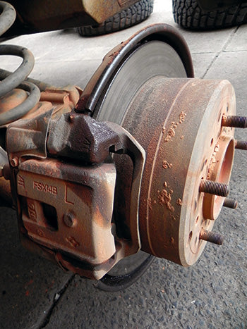 Check out that scoring on the brake drum. Adam welded it and machined it, good as new.