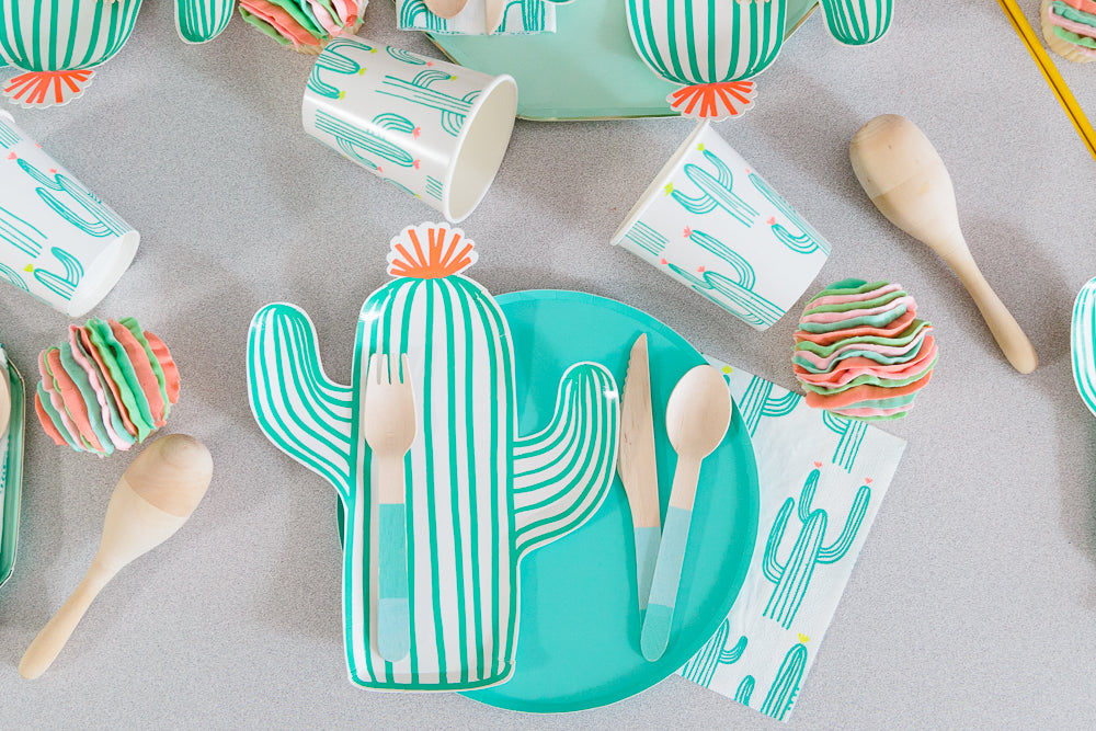 Cactus themed plates, napkins, and cups for a Mexican fiesta party.