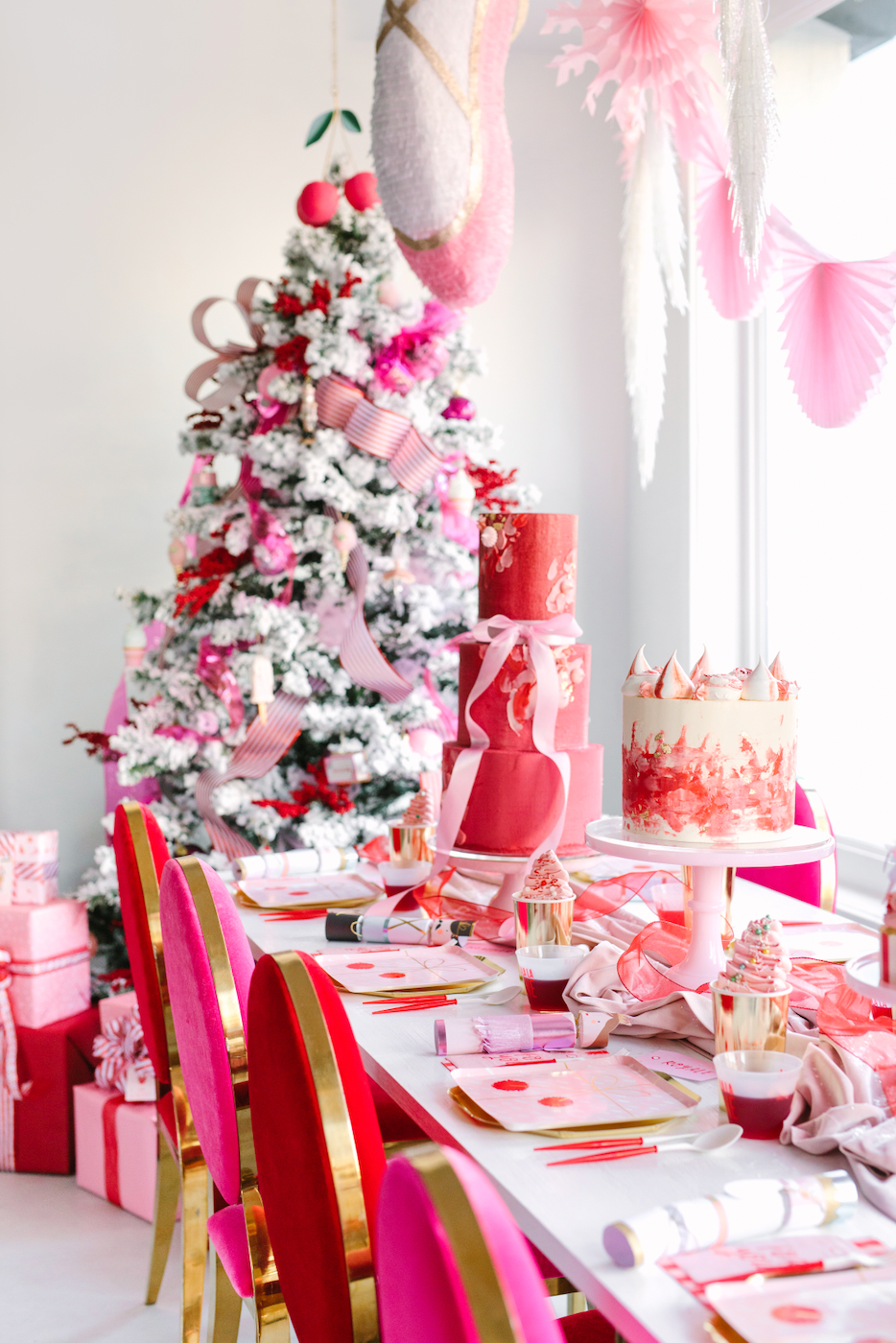 Red and pink Nutcracker themed Christmas party decorations.