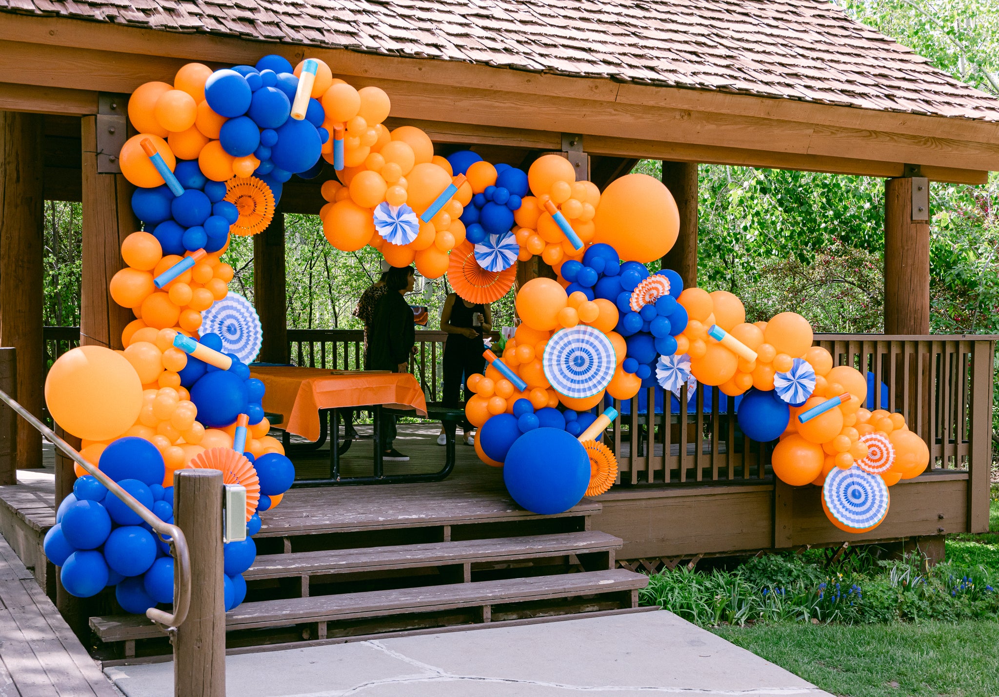 Nerf-themed birthday party balloon garland decoration.