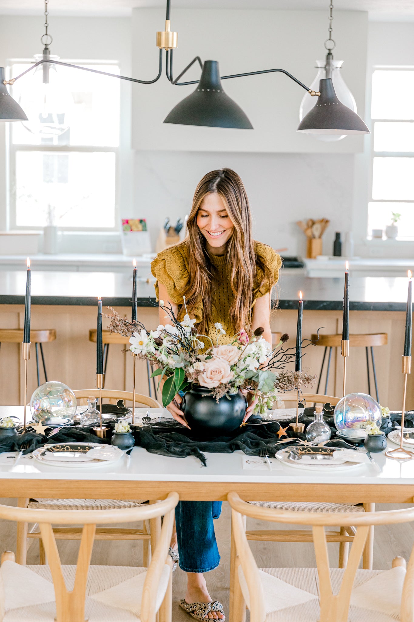 Setting the table with Harry Potter themed party supplies 